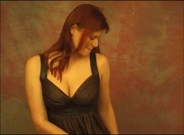 On her phone and showing boobs