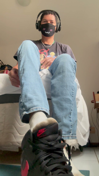 My little foot, socks and Nike, after a long day