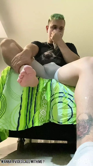 master shows off his sweaty feet and ripped socks