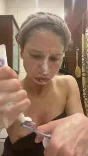 the girl came from a group sex and washed her mouth and face