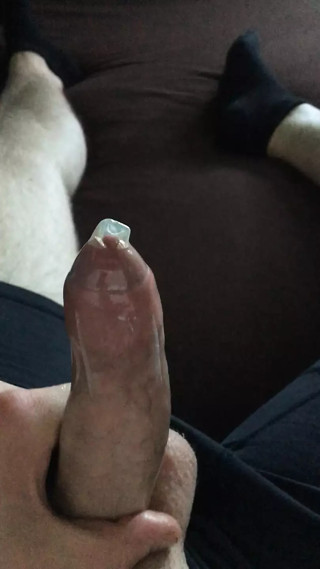 Shaved Cock Masturbating With Condom