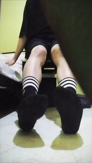 Twink teen boy showing his dirty stinky black socks