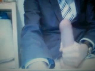 suit and tie jerking his huge uncut cock