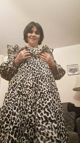 stepmother. showing what she has under her dress to her stepson&#039;s friend