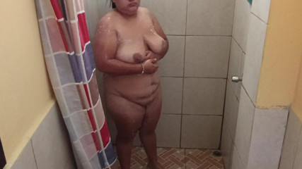 Taking a shower in a public restroom.