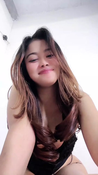 Petite Girl Showing Off Her Breasts Masturbating