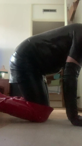 Crawling in my latex outfit