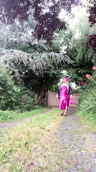 Dressed with a fuchsia dress for a night out