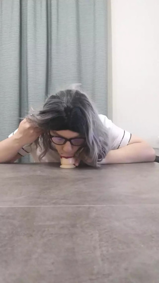 Rikki Sinclair schoolgirl sucking dildo