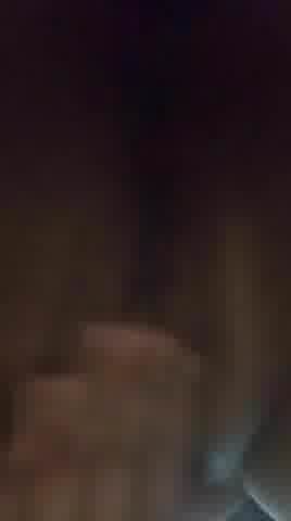 Masturbating