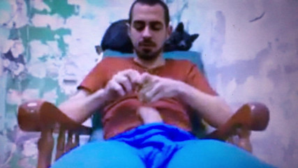 Latin guy shows how to put a condom on his monster cock