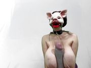 Masked pig slut sucks dildos and boob bouncing