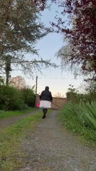 In casual attire with a white skirt one evening thumbnail