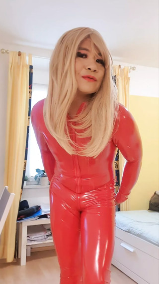 The Little Sissy in Red Catsuit thumbnail