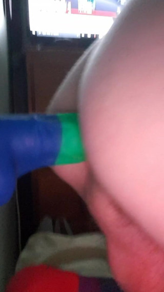 Boy fucks himself with dildo