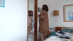 The owner of the hotel records me while I put on sunscreen to go to the beach and show off
