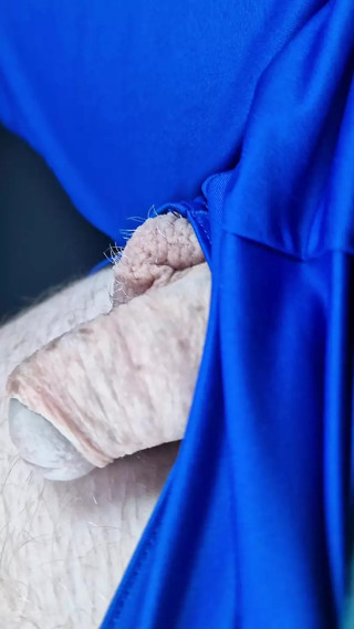 Cock peeking out from my shorts - commando style - with a commentary