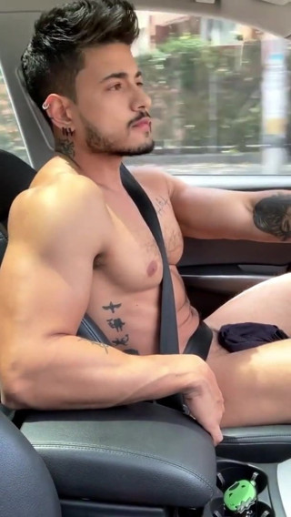 Naked handsome in the car