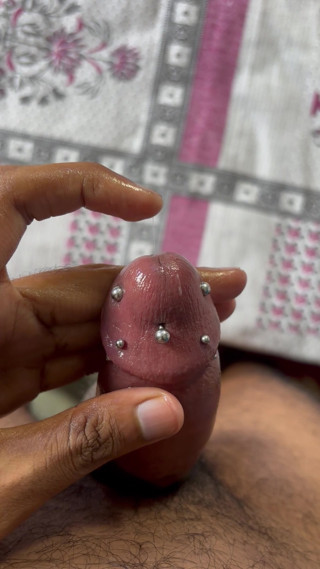The cock was teased and massaged vigorously.