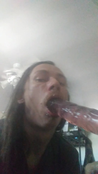 Sissy Mae deepthroats a dildo thumbnail