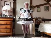 In a white and black maid outfit for a day