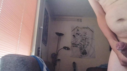 Masturbating standing for the window