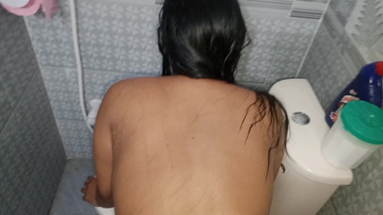 Desi Indian stepmom Her stepson fucked her while she was taking a shower, her stepson got horny after seeing her,