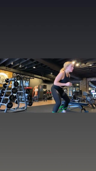 Natalie Alyn Lind working out at the gym