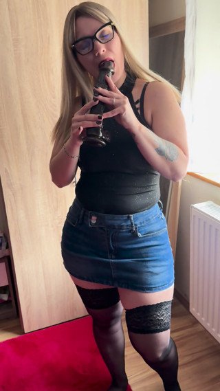 Masturbating with a Huge Black Cock in a Denim Miniskirt