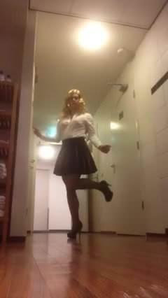 Crossdress Secretary Walking in Hotel Hallway