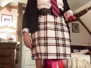 In a secretary outfit with a white plaid skirt