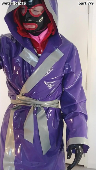 Putting on latex saint priest robe coat and rubber cape over schoolgirl sailor uniform, layers thumbnail