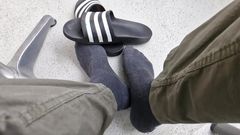 Addilettes with socks on the balcony 1