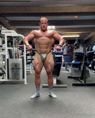 Muscle dad posing in gym: part one