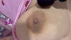 Mom plays with her vibrator and her huge tits