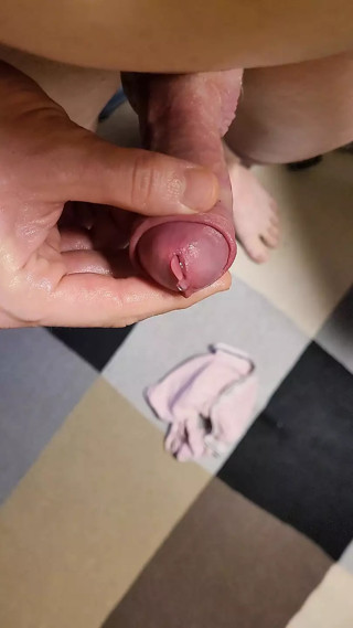 Edging and locking small penis in chastity cage thumbnail