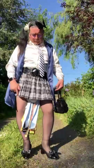 In an outfit with a small black and white checked skirt for an evening. thumbnail