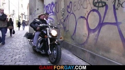 Muscle biker is seduced by a homo