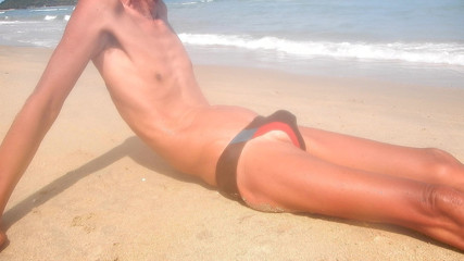 pissing on the beach
