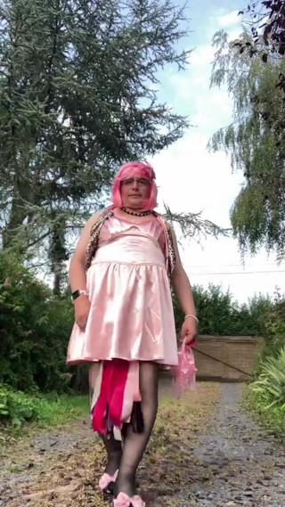 In an outfit with a pink dress for an evening out thumbnail
