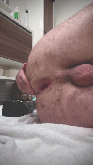 Guy fucks his ass with big black dildo and prolapse