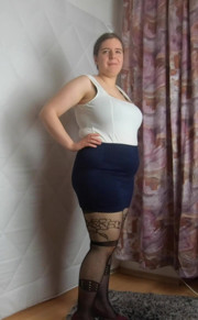 Mini skirt heels and fishnet stockings