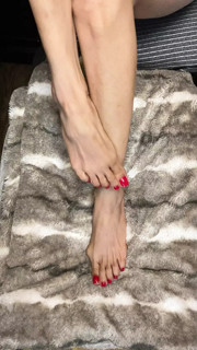 Those really nice red toes on those tiny feet