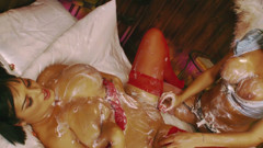 Two horny sluts covered in cream masturbate with toys
