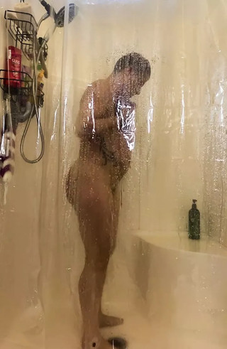 Wet naked ftm taking a long hot shower thumbnail
