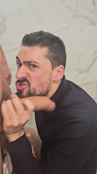 Hot daddy sucking twink big cock in a public bathroom