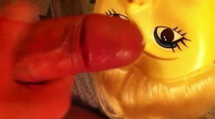 Cumming in dolls face