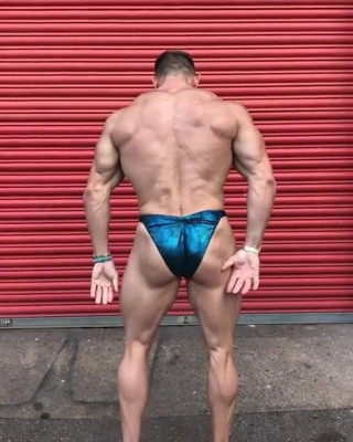 POSING OUTSIDE GYM