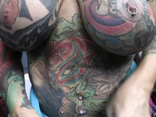 Heavily Tattooed And Pierced Biker Chick Black Widow Sucks