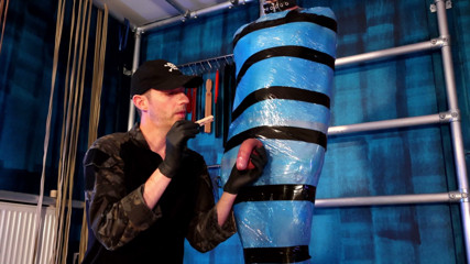 Twink Slave Bound in Pallet Wrap for Orgasm Control